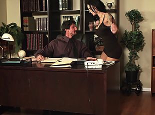 A guy fucks his hot cougar secretary on his desk in the office