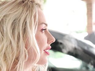 Blonde girl Angie Lynx sucking a hard cock after washing a car